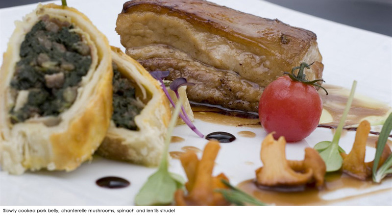 Slowly cooked pork belly, chanterelle mushrooms, spinach and lentils strudel